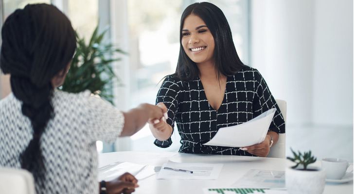 An advisor meeting with a client after their initial interview.