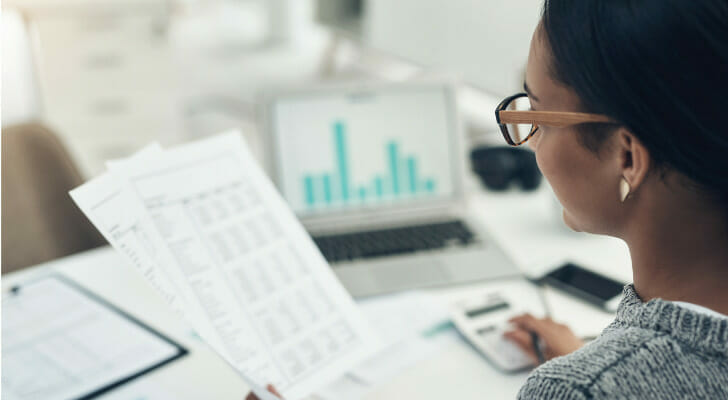 An investor reviews expense ratios to better understand their income investing strategy.