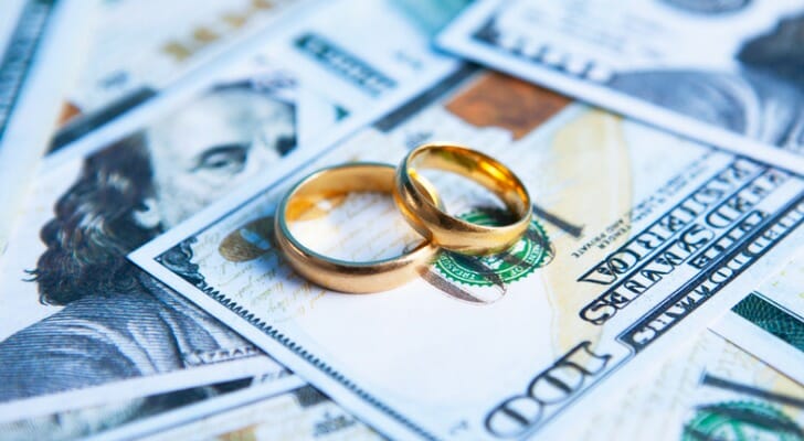 Some couples must choose between buying a home or having their dream wedding.