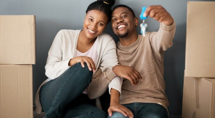 Happy young couple that just bought a house