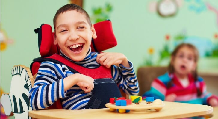 Cheerful boy with a disability