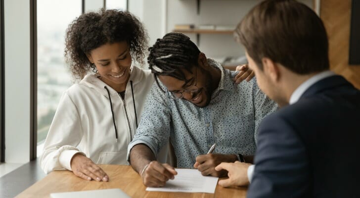 Black couple buying a house