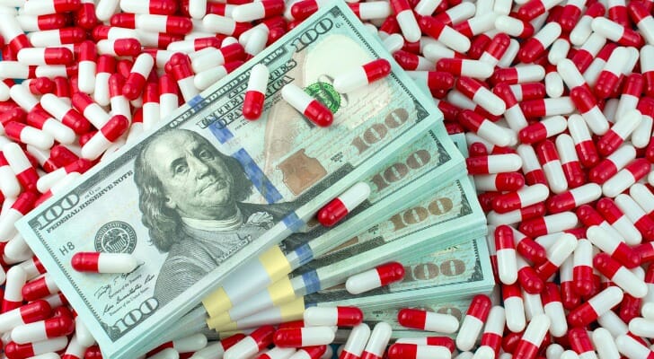 Prescription medicine and lots of $100 bills