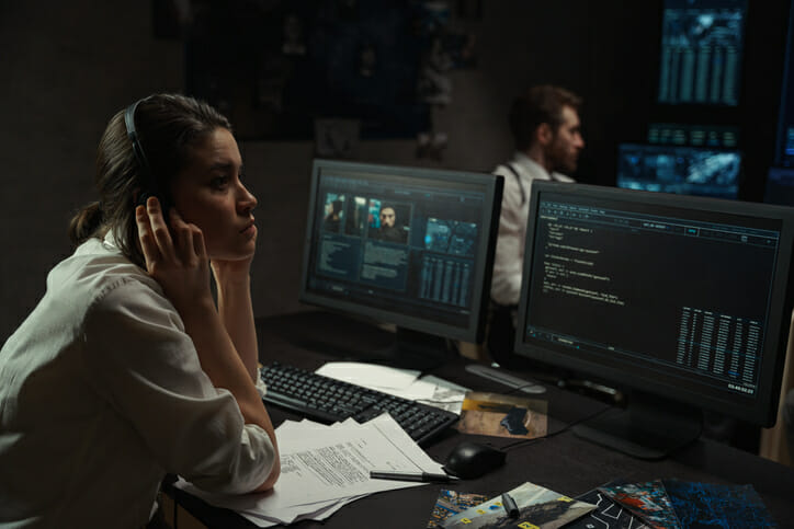 A woman considers why the diversification of investments is important and works to set up a diversified portfolio.