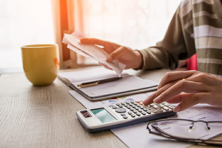 An investor reviewing how to avoid capital gains taxes on land sale.