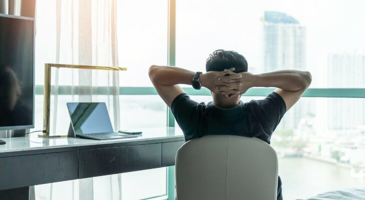 A man thinking about his average net worth and how he compares with his age group.