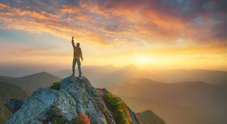 Mountain climber at the summit.