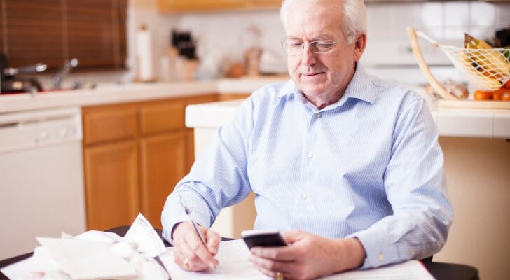 Self-employed man paying quarter taxes