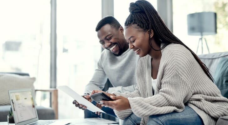 A couple deciding how to invest $40,000.