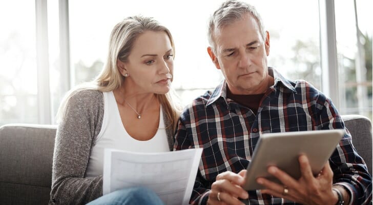 A couple reviewing capital gains exemptions for seniors.
