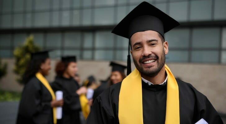 A young man graduates college, his expenses paid for using a 529 investment strategy determined by age.