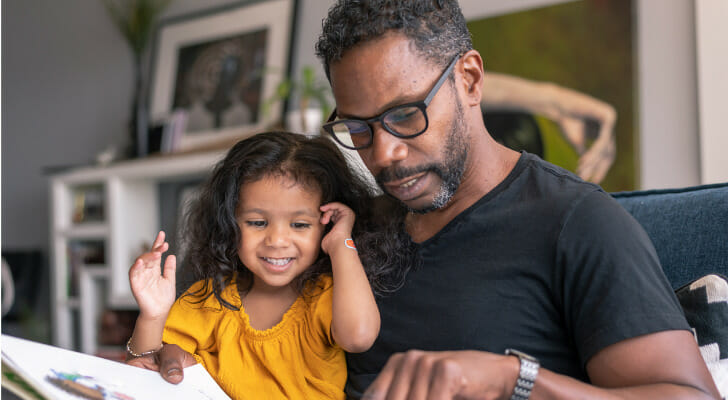 A father reviews how to create a trust for his child.
