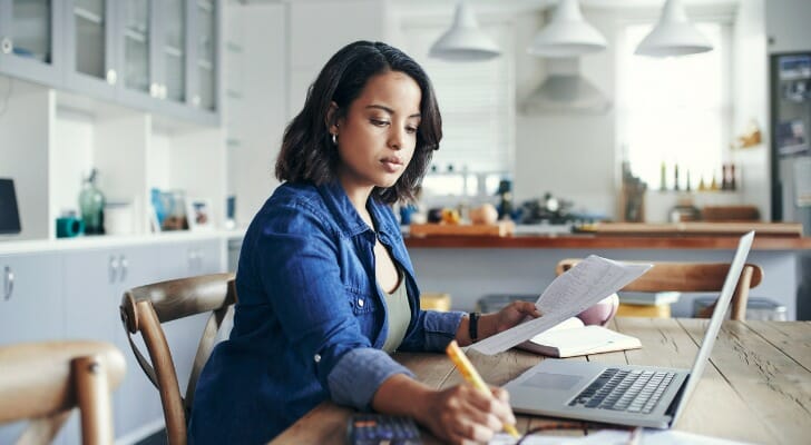 A woman reviews different investment styles.