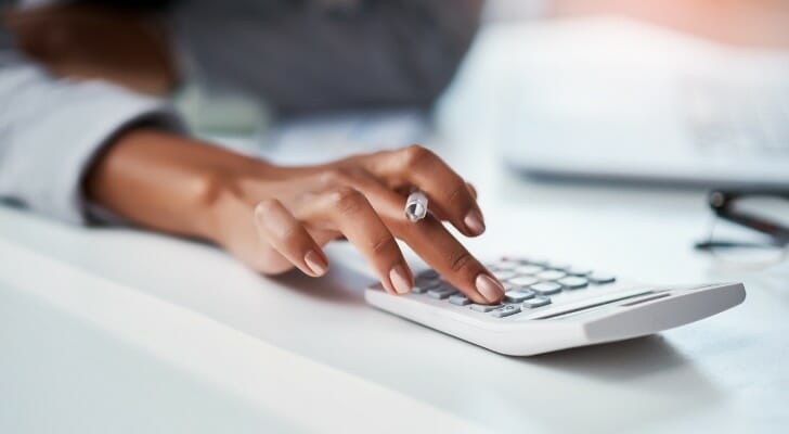 An investor researches how to buy property with delinquent taxes.