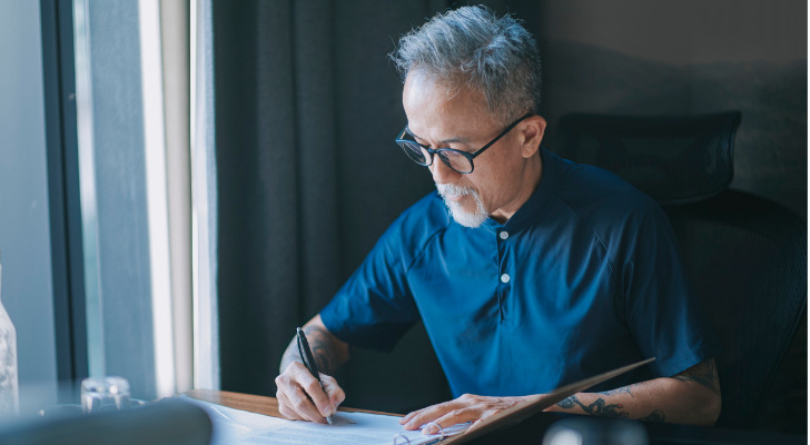 A man reviewing if trust funds gain interest.