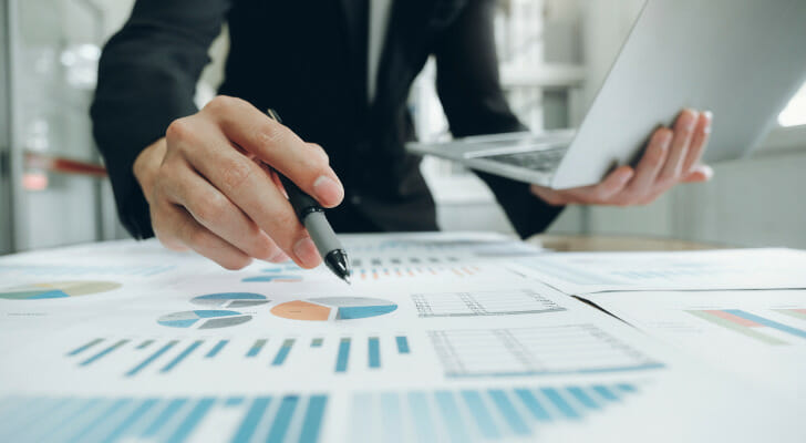 Man checks how his indexed annuity is doing.