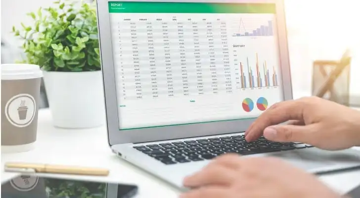 A fiduciary advisor reviewing the portfolio of a client.