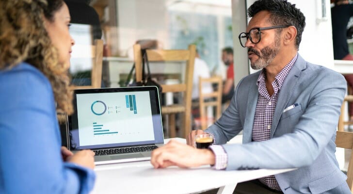 An advisor and client discuss how to invest 200k to make $1 million.