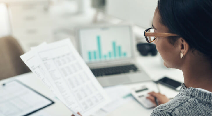 An investor reviewing dividend recapitalization.