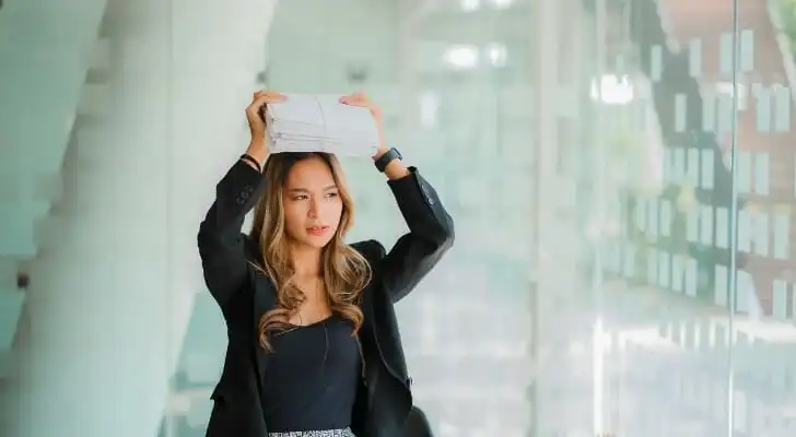 A woman considering how much interest you can earn on $1 million.