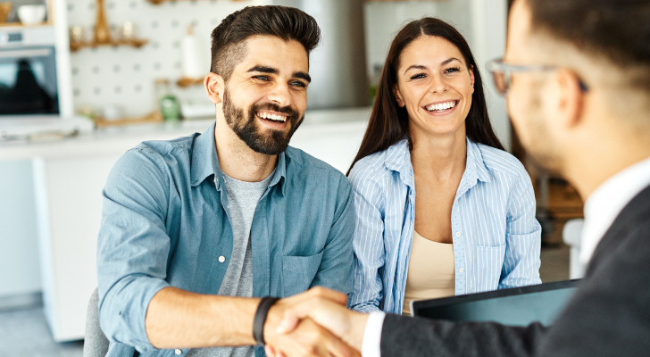 A couple sitting down with their RICP.