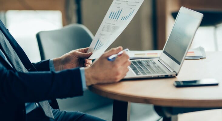 Financial advisor reviews a model portfolio. These products have gained popularity, according to Morningstar.