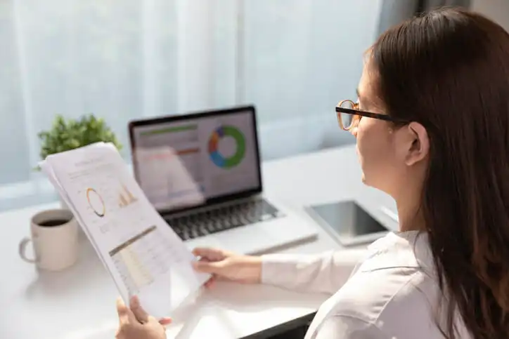 A woman reviews how to invest $100,000 for passive income.