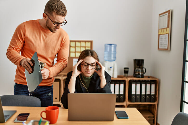 A couple researching how a mortgage transfer works.