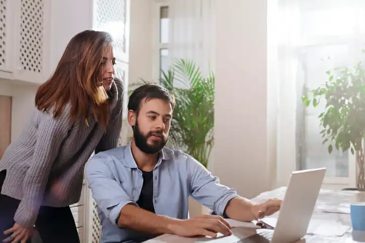 A couple decide how to invest $100,000 for passive income.