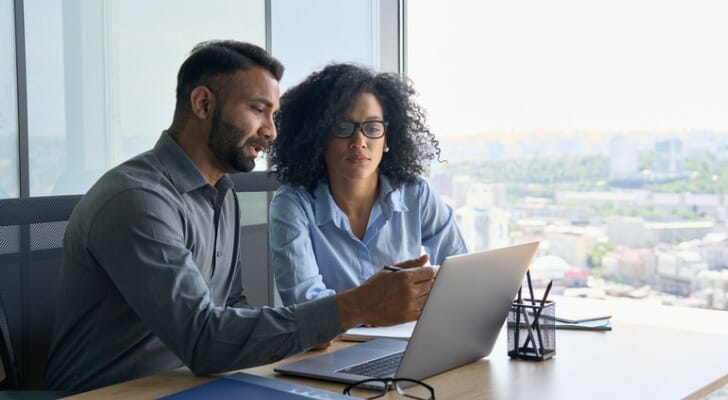 A financial advisor creating a financial plan with a client.