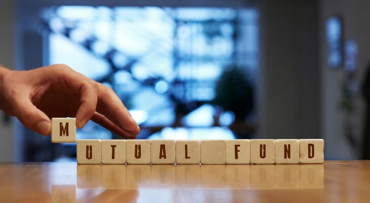 Wooden blocks spelling out "mutual fund."