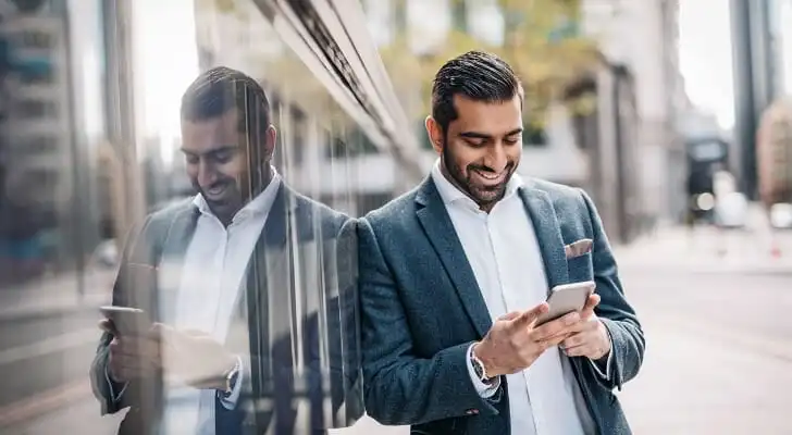 An investor checking his portfolio to see how much interest he can earn on $1 million.