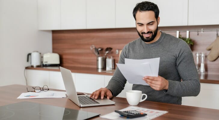 A high earner reviews his tax returns.