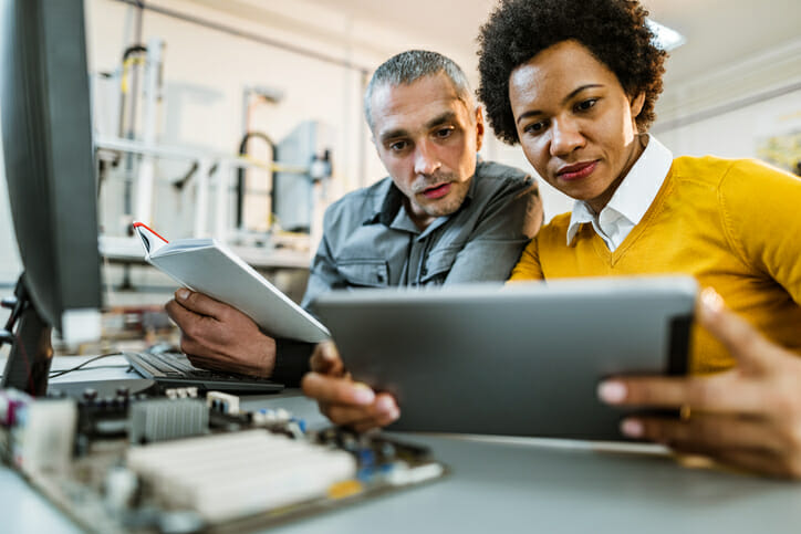 A couple comparing the benefits and drawbacks of saving in a CD vs. a savings account.