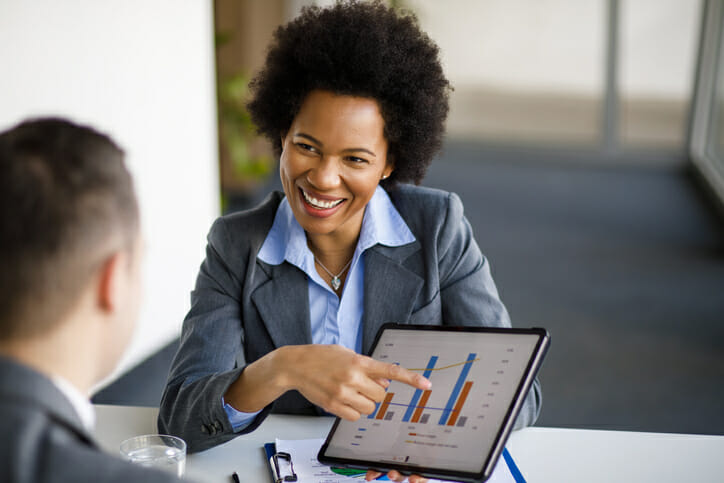 A financial advisor reviewing a savings plan with a client.