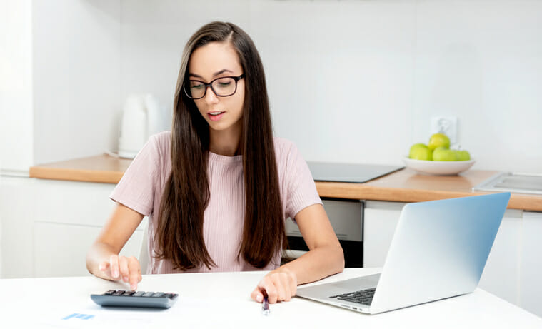 A woman reviews her emergency fund.