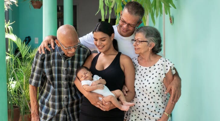 A mother introduces her child to her family.