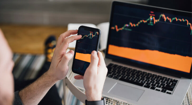 An investor reviewing a stock chart.