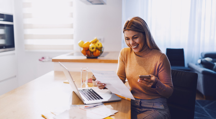 A woman checking her brokerage account.