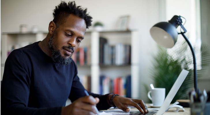 A man reviewing his savings accounts.