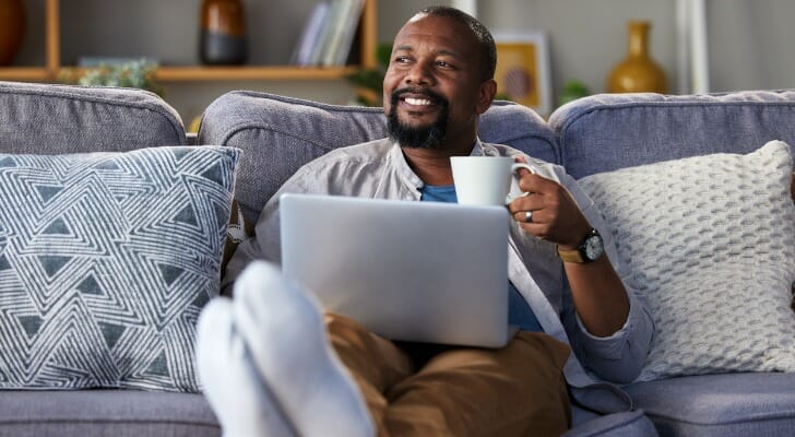 A man reviews his online savings account.