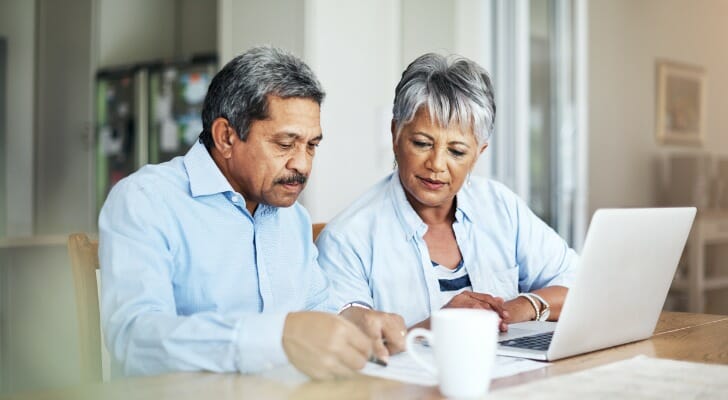 A couple compare their 401k vs savings account.