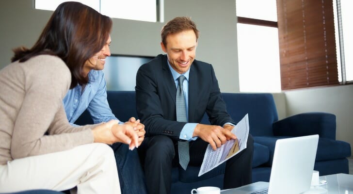 An advisor and client discuss using a financial advisor vs. self investing.