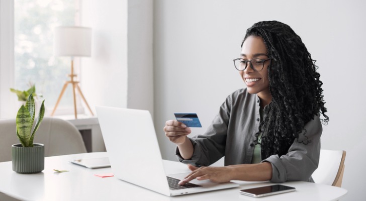 A woman setting up an online savings account.