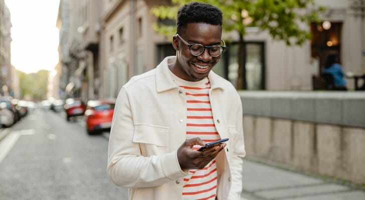 A man checking his online savings account.