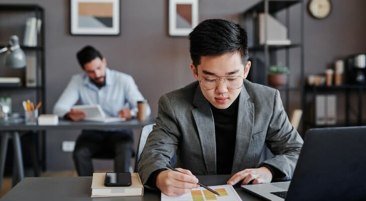 Advisors reviewing portfolio performance.