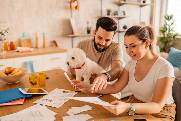 A couple creating a wedding savings account.