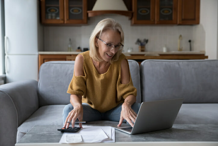 A woman trying to figure out how much interest she could earn from $250,000.