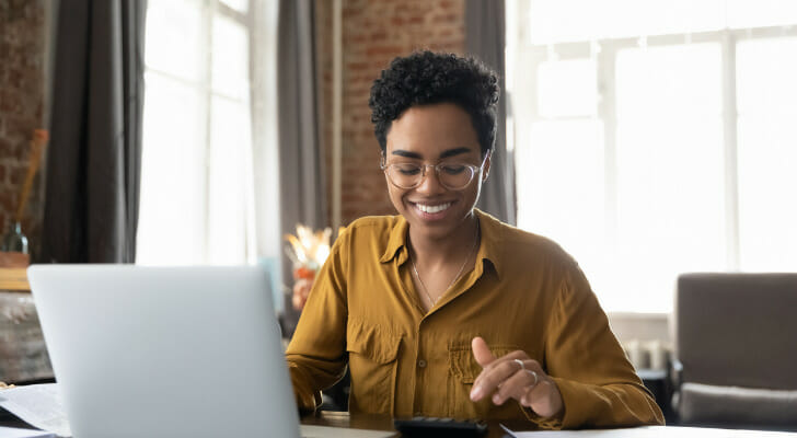 A woman reviewing her money market account.