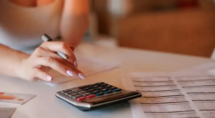 A taxpayer using a calculator.